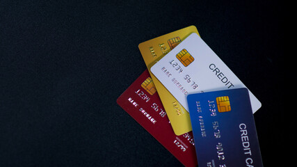 Focus and Close-up many credit cards, black screen background, Payment concept, Shopping Concept,...