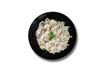 food dish with pasta with white sauce and shrimp. Top view.