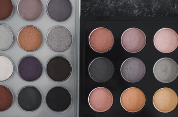 cosmetics and beauty, close-up of two similar eyeshadow palettes with neutral nude tones next to...