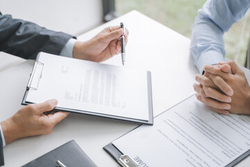 Employment concept, Employer recruiter with candidate with resume in job interview.