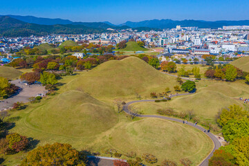 Panorama of Tumuli park and other royal tombs in the center of Korean town Gyeongju