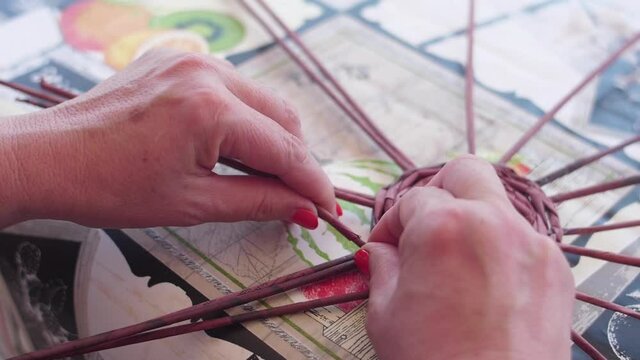 making handcraft traditional straw basket slow motion