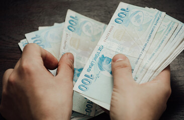 hand with Turkish money. Turkey lira.