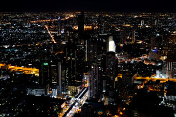 Fototapeta na wymiar Bangkok, Thailand - June 1, 2020: view from the observation deck King Power Mahana Khon, contrasting night city from above