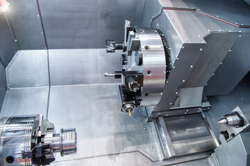 CNC milling machine, modern automatic metal processing equipment.