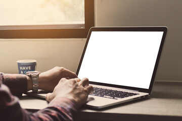 computer mockup image blank screen.hand woman work using laptop with white background for advertising,contact business search information on desk at coffee shop.marketing and creative design