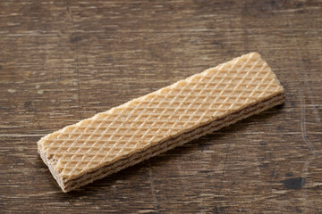 wafer chocolate dessert on wooden background