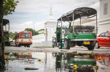 Tuk Tuk taxi waiting customers about Wat Phra Kaeo Bangkok