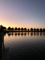 Obraz premium sunset over the river