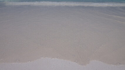 Small waves hit the shore