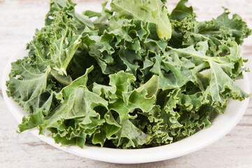 Fresh healthy nutritious curly kale as ingredient of coctail