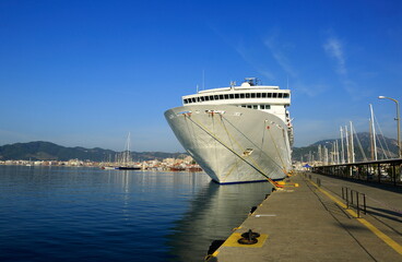 Mandraki Harbor, Rhodes; A cruise ship in the harbor.