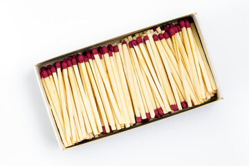 Wite cardboard box with match sticks isolated