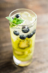 Blueberry cocktail with kiwi fruit. Selective focus. Shallow depth of field.