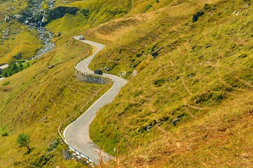 Landscape tourist path iconic winding curved road Italy Piedmont Alps circa September 2013