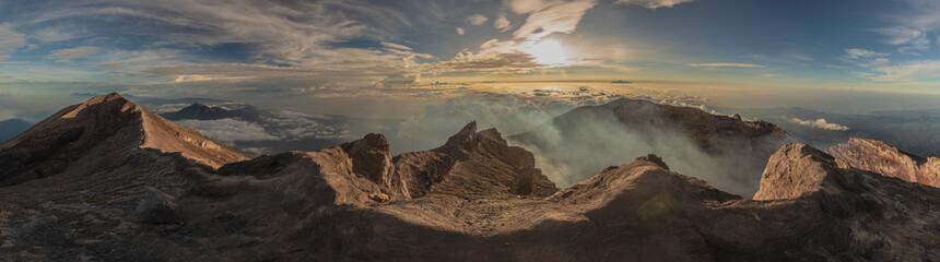 sunrise at the top of agung volcano. crater view. Higher than clouds. rinjani view. High quality...