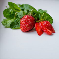 Strawberries with green leaves isolated on white background copyspace