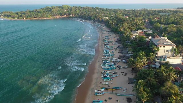 Arugam Bay Beach, Sri Lanka Island. Drone Aerial View of Indian Ocean Waves and Beachfront With Resorts