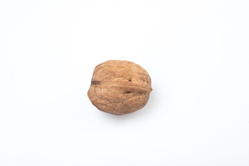 Walnuts isolated on white. Clean surface. Top view | above, heart shaped nut. Copy space for text editing, white background. Close up