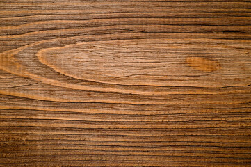 Fototapeta premium The texture of the wooden background consisting of boards painted in the color of wenge, designed for photographs.