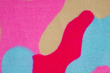 Tight cotton with a bright summer print, photographed close-up.