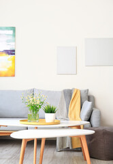 Interior of modern living room with comfortable sofa