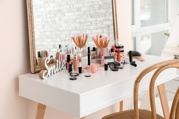 Set of decorative cosmetics on table
