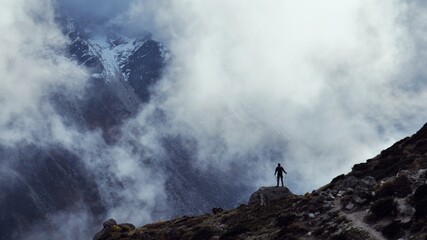 Man in hike on the top of the mountain, enjoy the epic view