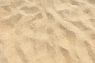 Fototapeta na wymiar Sand texture in summer sun