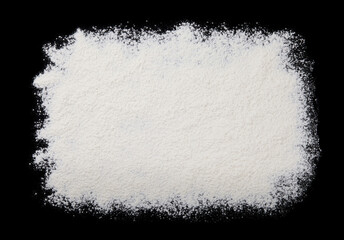 A pile of flour isolated on black background.