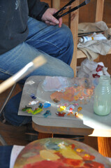 artist painting with brush