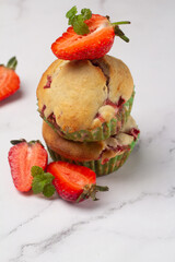 strawberry muffins on a white background.