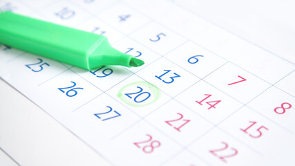 20th of the month. Calendar with a marker