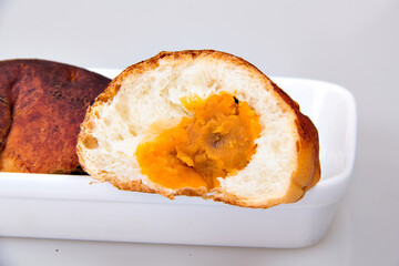 Bun slice with scrambled eggs

