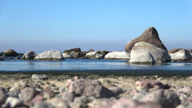 Coastal rocks of Cape Kolgompya on a may day. Leningrad region, Russia   