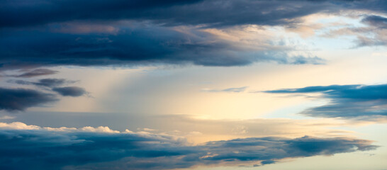 Naklejka na ściany i meble Wide background with evening clouds