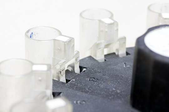 The detail of tubes inside centrifuge machine at the lab. Research virus, macro view. Control of sample with blood in a laboratory. - Powered by Adobe