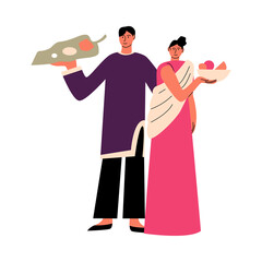 Indian man and woman in traditional clothing holding plates with food at holiday