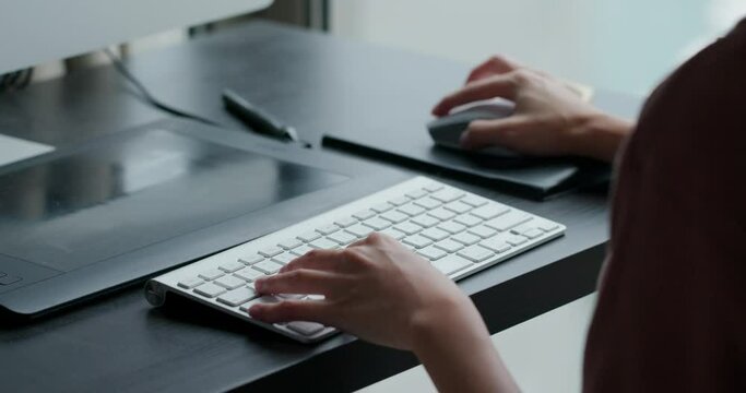 Type on computer keyboard at office