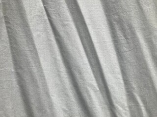 white cotton fabric sheet which is crumpled in natural lines pattern, using for the background
