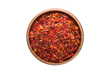 dried tomato powder spice in wooden bowl, isolated on white background. Seasoning top view