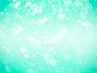 green background with soft bokeh lights.