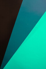 background of three colors: black, dark green and light green
