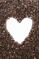Chia. Seeds on white background. Food heart shape.