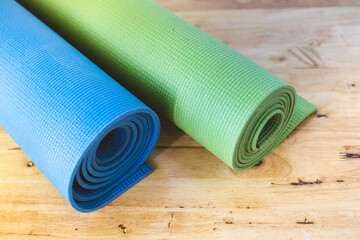 Yoga mats, two rolls, blue-green