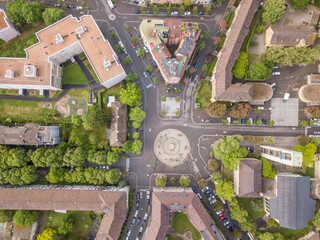 Aerial view of buildings and urban cityscape with streets in overhead view. Beautiful roof of urban...