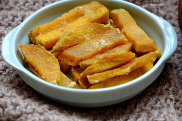 healthy food for vegetarian, sliced of baked yellow squash, nutrition for vegan meal or non meat diet