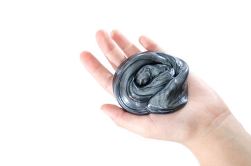 gray slime on a palm isolated on a white background. Copy of space. Place for text. View from...