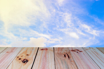 Blank wooden table with sun light and blue sky Background, This picture idea for product show.
