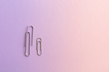 paper clips . The idea for the design of school notebooks.